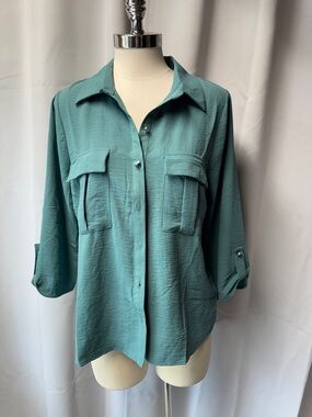 Ladies Naïf size M blouse green in color